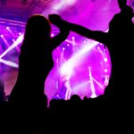 women-dancing-concert